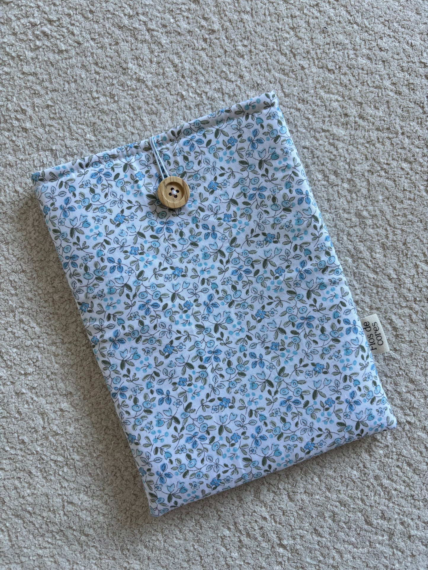 Funda libro botón
